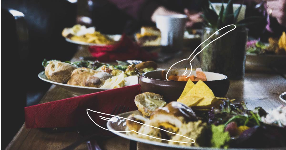 A buffet table filled with food. Text reads: Yeah, you don't need all of this.